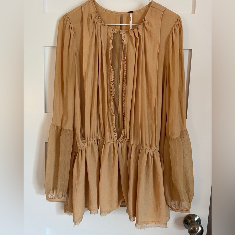 Like new free people golden yellow blouse size small but wears oversized